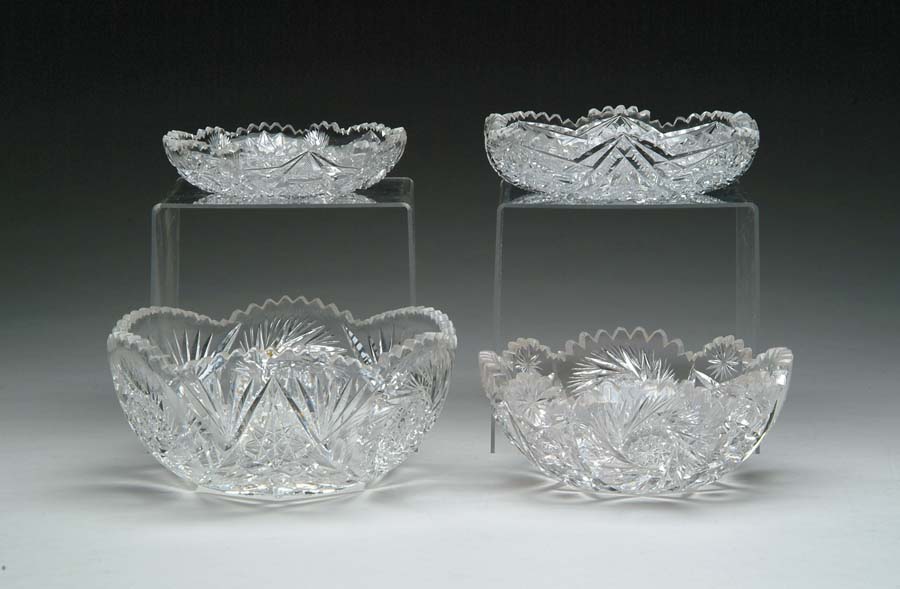 Appraisal: FOUR CUT GLASS BOWLS Lot consists of two bowls cut