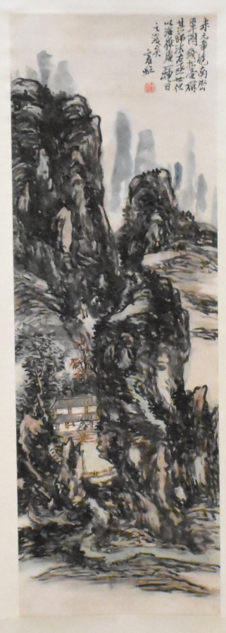 Appraisal: A Chinese scroll painting of a landscape attributed to Huang