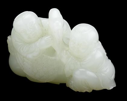 Appraisal: Fine Chinese white jade boy and goose grouping th century