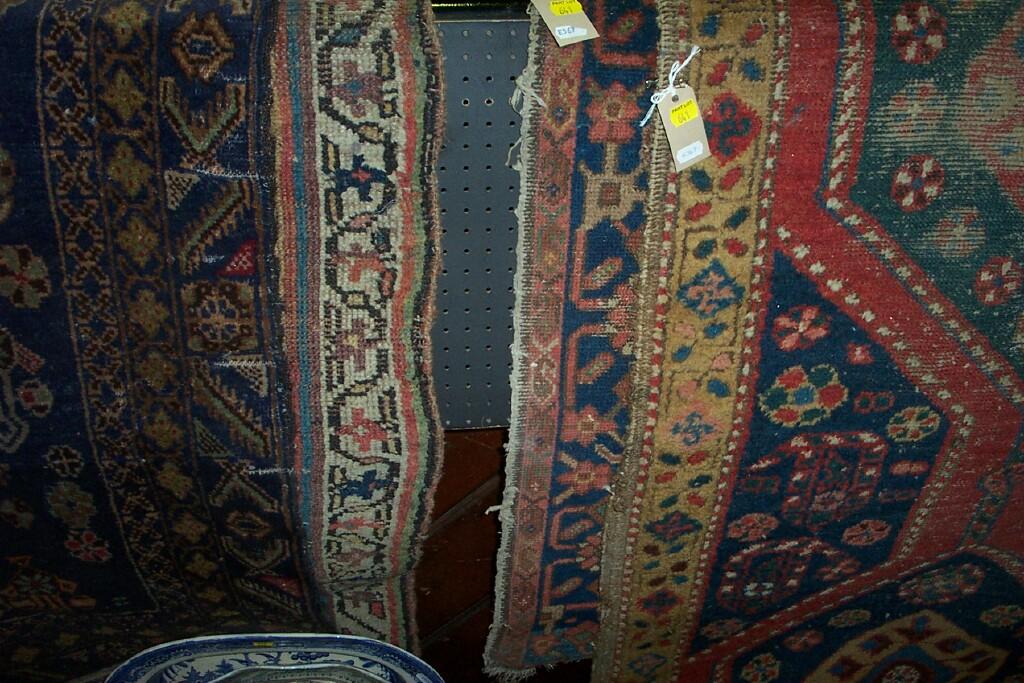 Appraisal: A collection of four various eastern wool rugs with polychrome