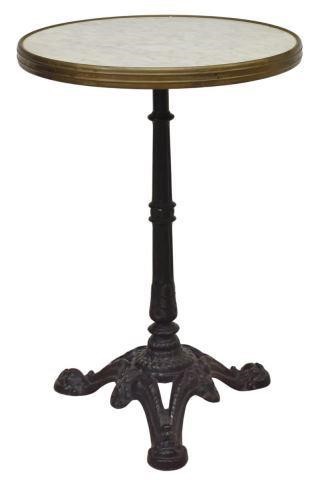 Appraisal: Parisian cast iron bistro table th c round marble top