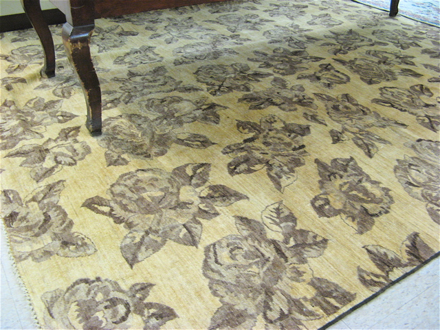 Appraisal: HAND KNOTTED ORIENTAL CARPET Pakistani Zeigler overall repeating single brown