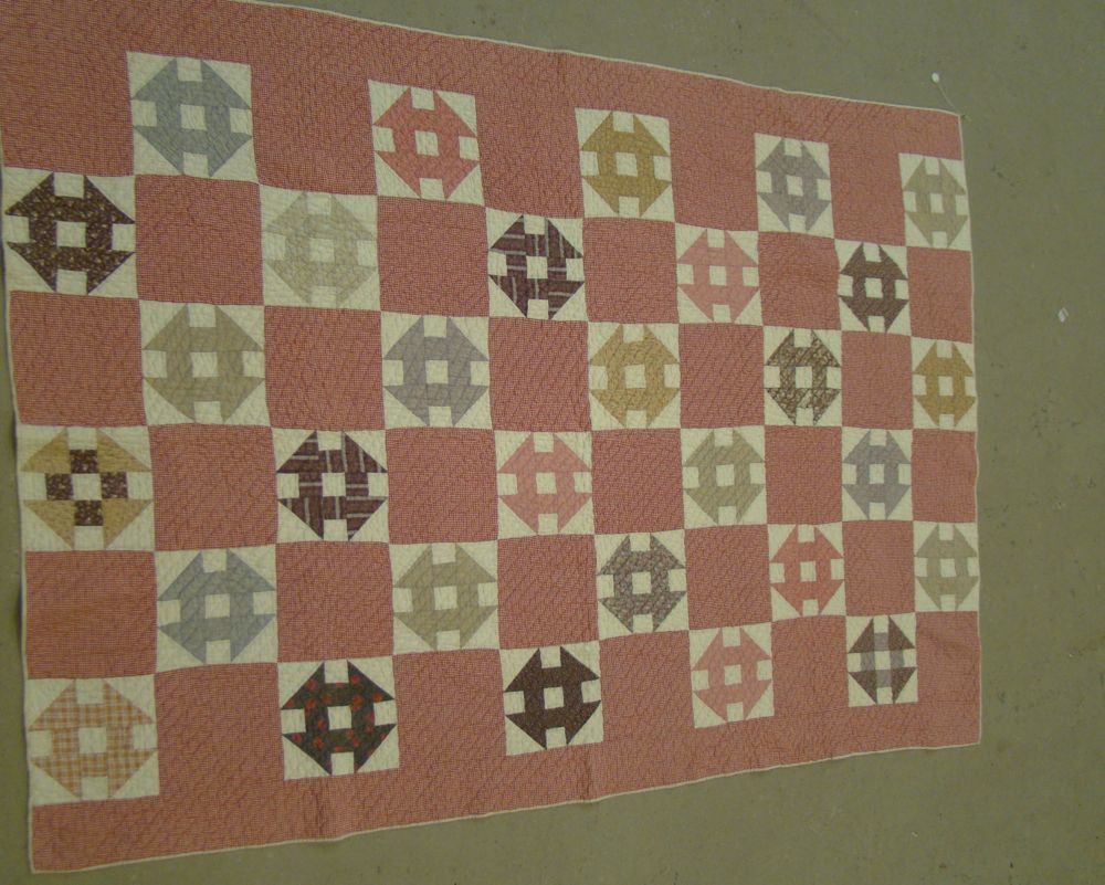 Appraisal: RED WHITE AND BROWN PIECED QUILT Late th Early th