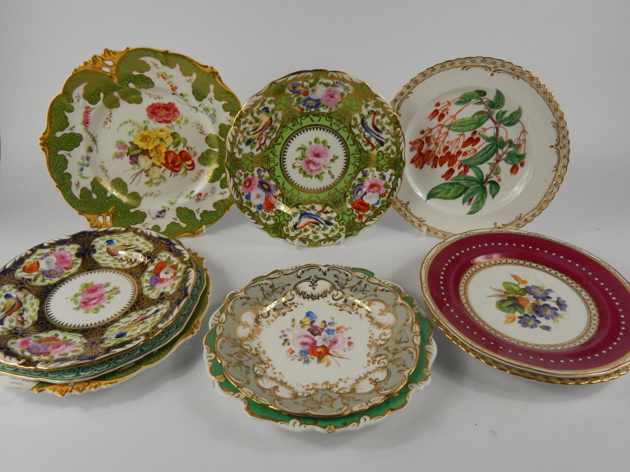 Appraisal: English porcelain thC plates with painted botanical decoration the green