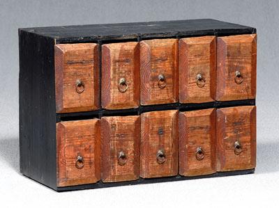 Appraisal: Ten-drawer Chinese apothecary cabinet beveled drawers with brass ring pulls