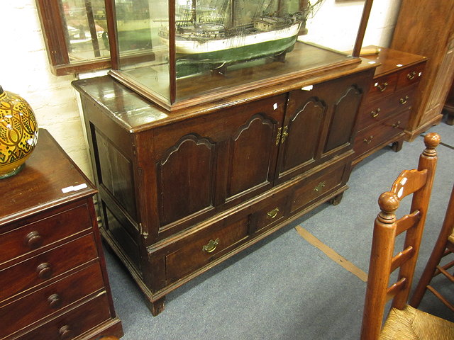 Appraisal: AN ANTIQUE AND LATER OAK CARMARTHEN COFFER with panelled doors