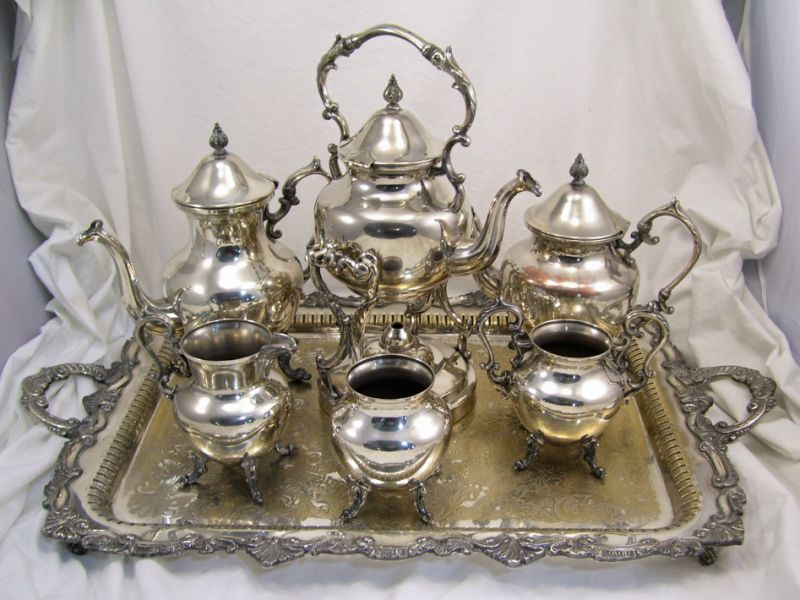 Appraisal: Silverplate Tea Set with Tray Set includes Hot water kettle