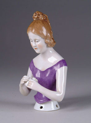 Appraisal: GIRL WITH ELABORATE HAIRDO PINCUSHION This young lady with her