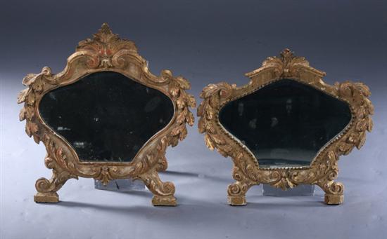 Appraisal: PAIR CONTINENTAL DIMINUTIVE ROCOCO GILTWOOD MIRRORS th century Both having