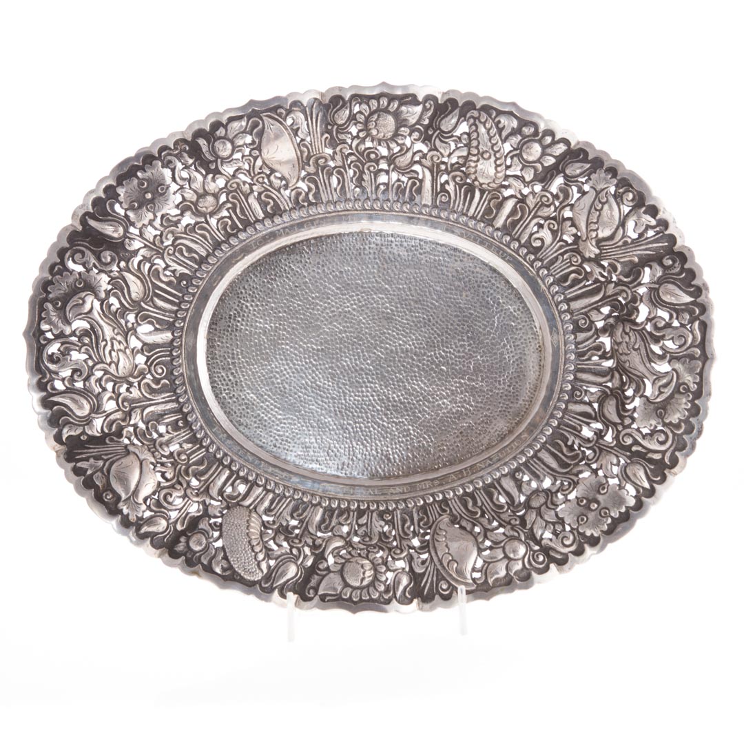 Appraisal: Continental hammered silver oval dish embossed with peonies pomegranates and