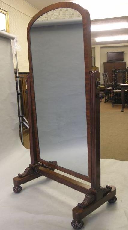 Appraisal: A William IV mahogany cheval mirror domed plate adjustable on