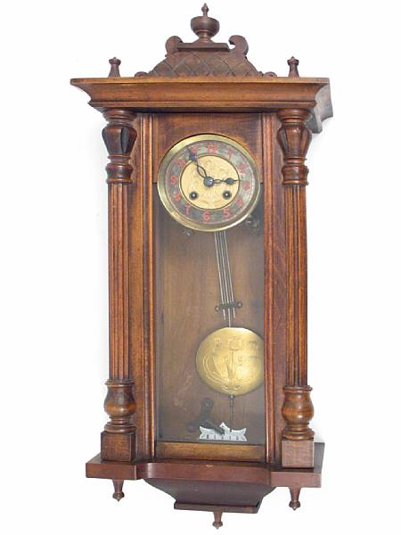 Appraisal: A walnut wall clock early th century height in width