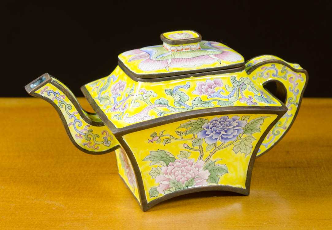 Appraisal: CHINESE CANTON ENAMEL TEAPOT with yellow ground and floral decoration