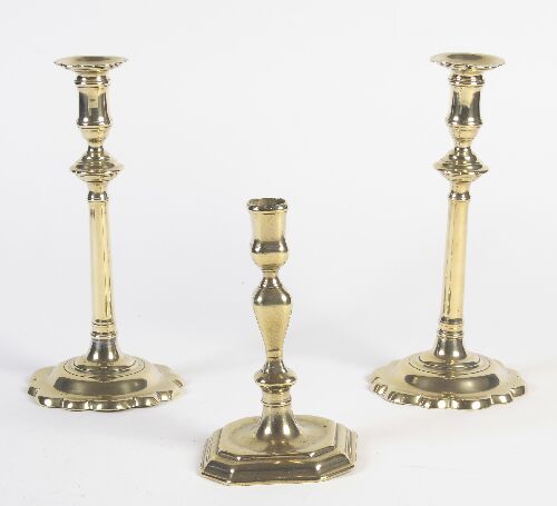 Appraisal: A pair of late th century brass candlesticks each with