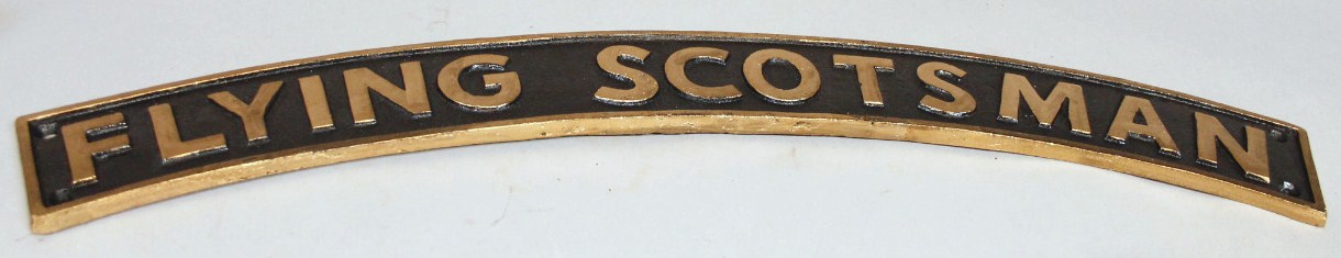 Appraisal: A modern metal flying Scotsman sign in gold and black