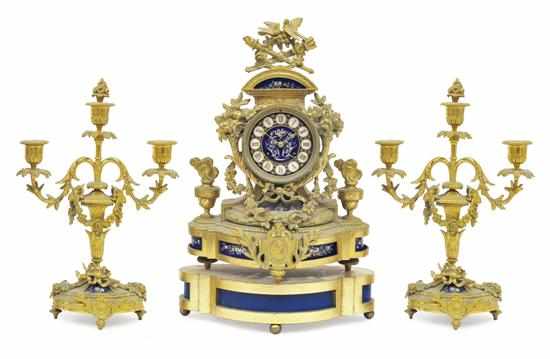 Appraisal: A FRENCH GILT METAL AND PORCELAIN CLOCK GARNITURE CIRCA The