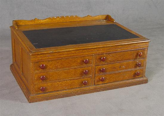 Appraisal: Grain Painted Shopkeeper's Desk Circa Paneled ends Scalloped gallery Six