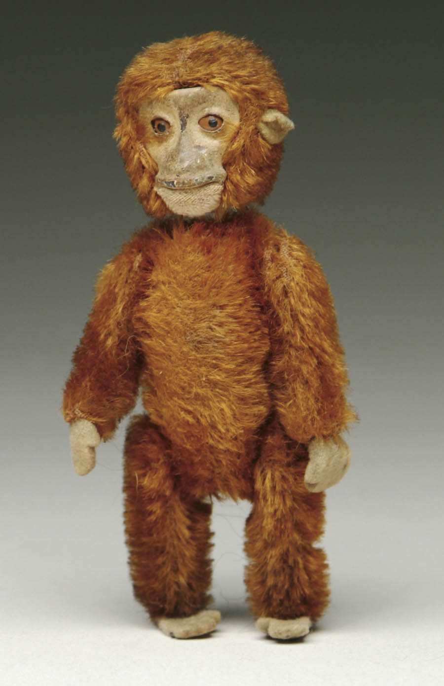 Appraisal: SCHUCO MONKEY PERFUME BOTTLE cm jointed at shoulders and hips