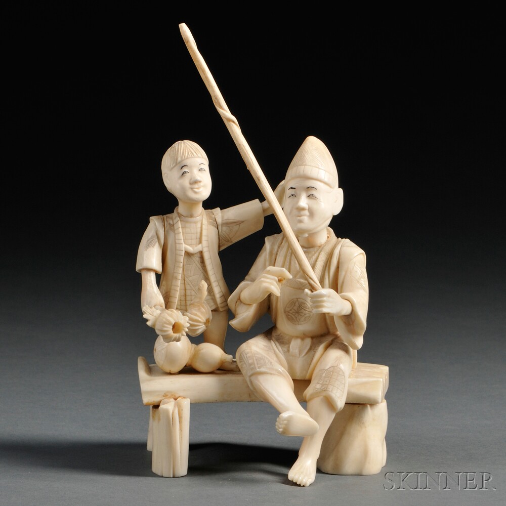 Appraisal: Ivory Carving of a Fisherman Japan seated on a bench