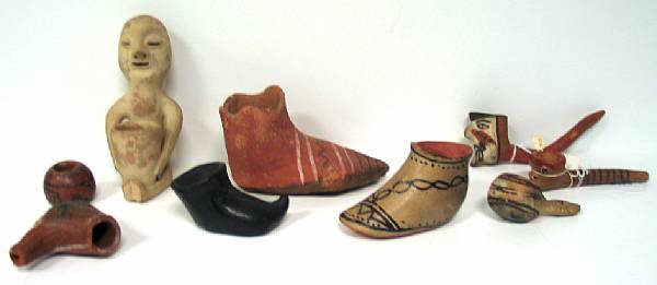 Appraisal: Nine Pueblo pottery items Three model shoes four pipes a