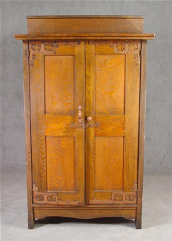 Appraisal: Oak Arts Crafts Style Two-Door Cabinet Circa hammered copper hardware