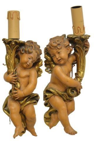 Appraisal: pair Italian parcel gilt winged putto wall sconces likely Anri