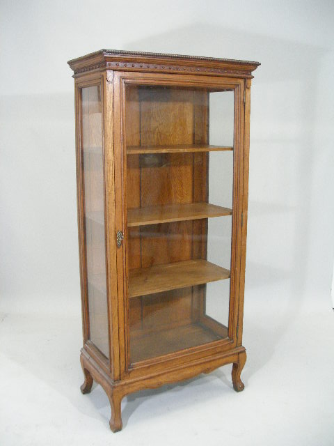 Appraisal: Oak Display Cabinet c vertical form with beaded and molded