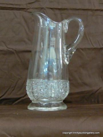 Appraisal: Circa Pressed Glass Footed Water Pitcher - with applied handle