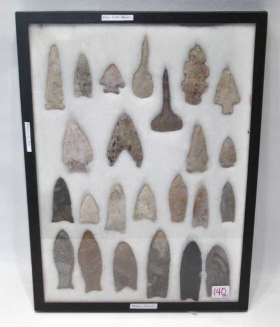 Appraisal: NATIVE AMERICAN SPEAR POINTS AND TOOLS Riker case with twenty-four