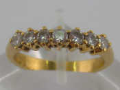 Appraisal: A yellow metal tests carat gold seven stone diamond ring