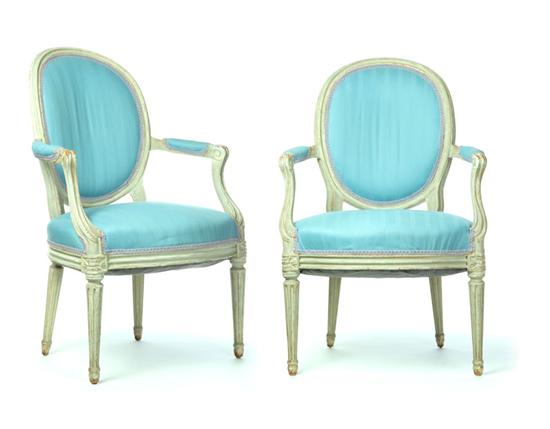 Appraisal: TWO ARMCHAIRS IN THE HOLLYWOOD REGENCY STYLE America mid th