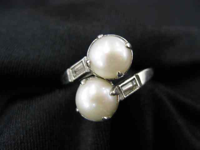 Appraisal: Platinum Diamond Pearl Ring two fine mm pearls with baguette