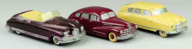 Appraisal: THREE PROMOTIONAL AUTOS Die-cast includes Nash with roof ad for