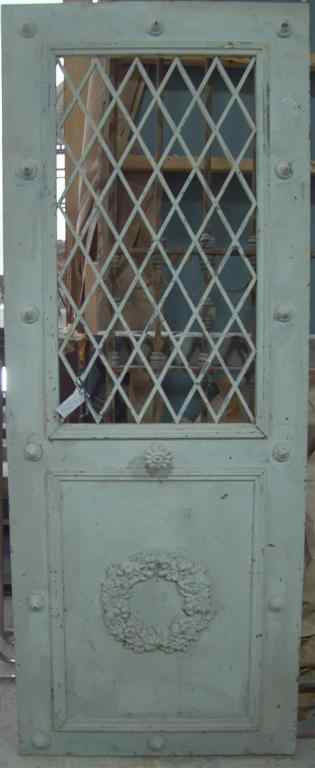 Appraisal: FRENCH METAL DOOR with pierced lozenge lattice work in upper