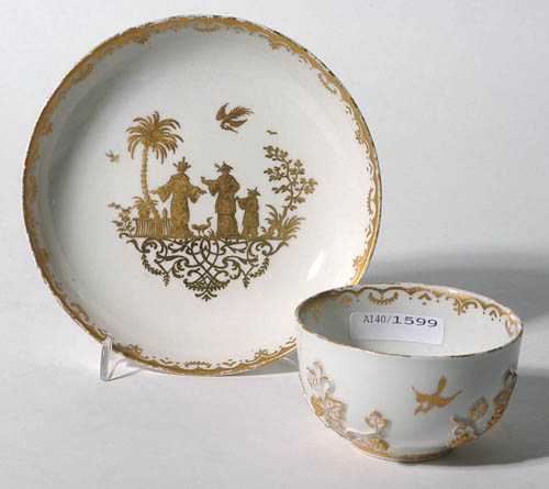 Appraisal: CUP AND A SAUCER WITH CHINESE MOTIF Meissen mid th