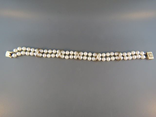 Appraisal: Pearl and k Gold Bracelet double strand criss-cross spacers filagree