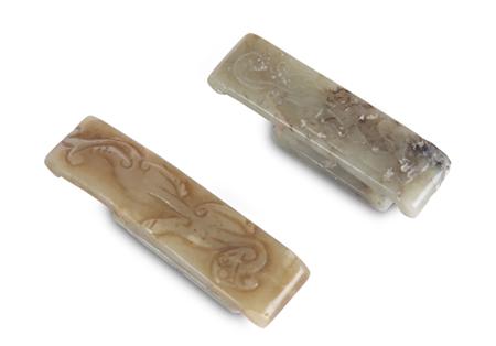 Appraisal: A Chinese celadon jade scabbard fitting the top with a