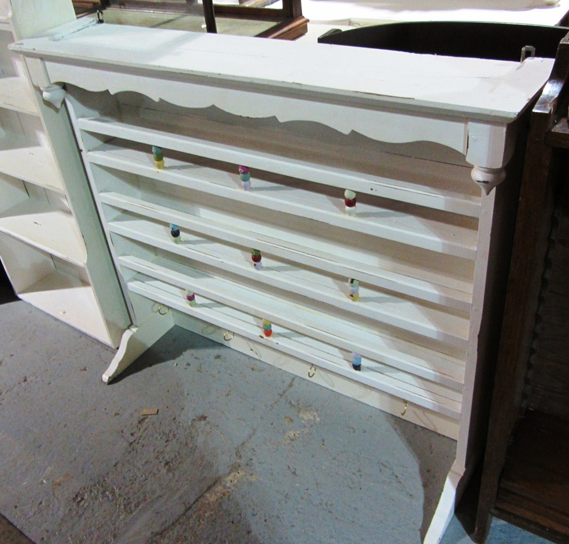 Appraisal: A white painted five tier plate rack