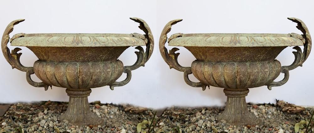 Appraisal: Pair of Cast Iron Garden Urns Gadrooned form with applied