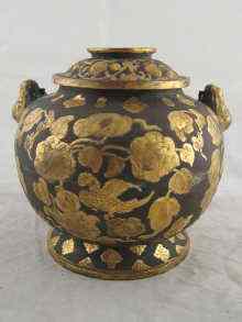 Appraisal: A Chinese swing handled globular pot and cover with gilt