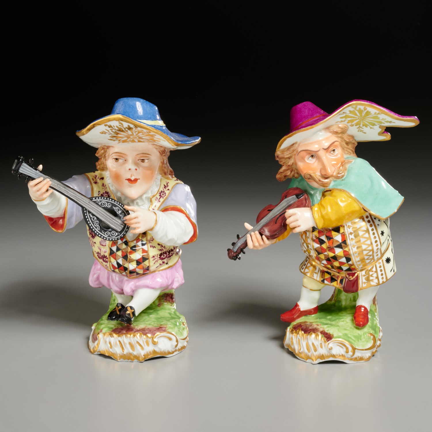 Appraisal: PAIR DERBY PORCELAIN MANSION HOUSE DWARFS c - violin and