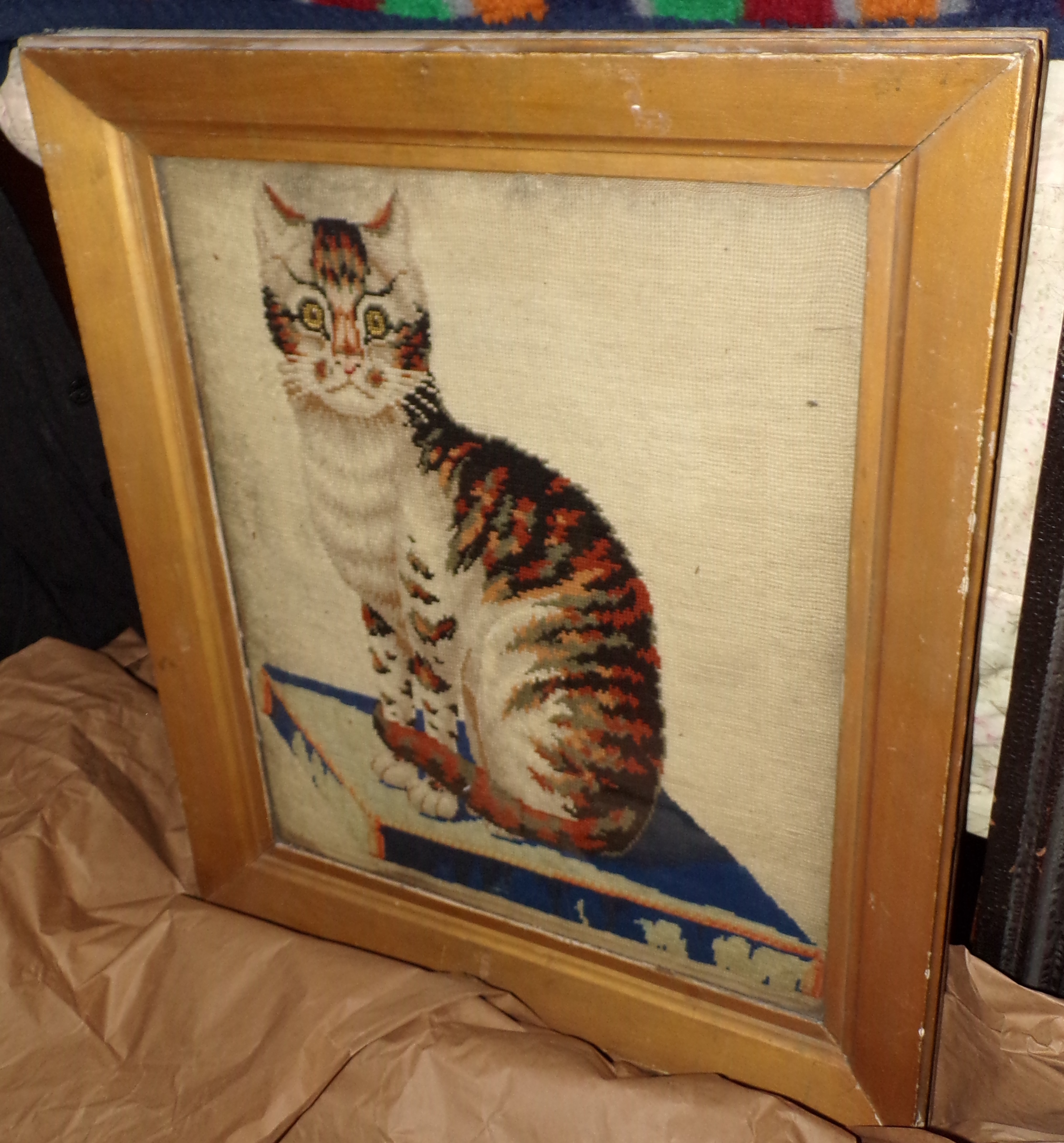 Appraisal: Victorian needlepoint textile of A Seated Cat x ''