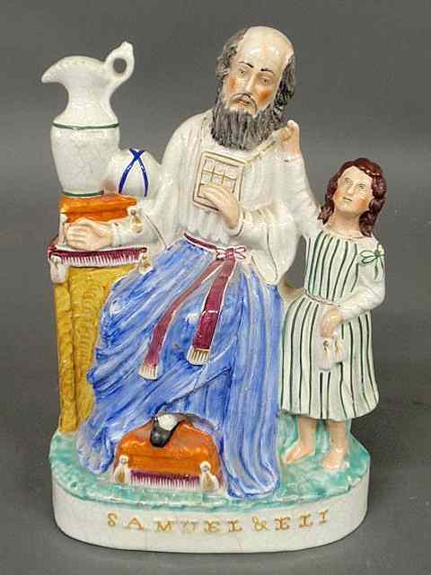 Appraisal: Colorful th c Staffordshire figural group Samuel Eli h