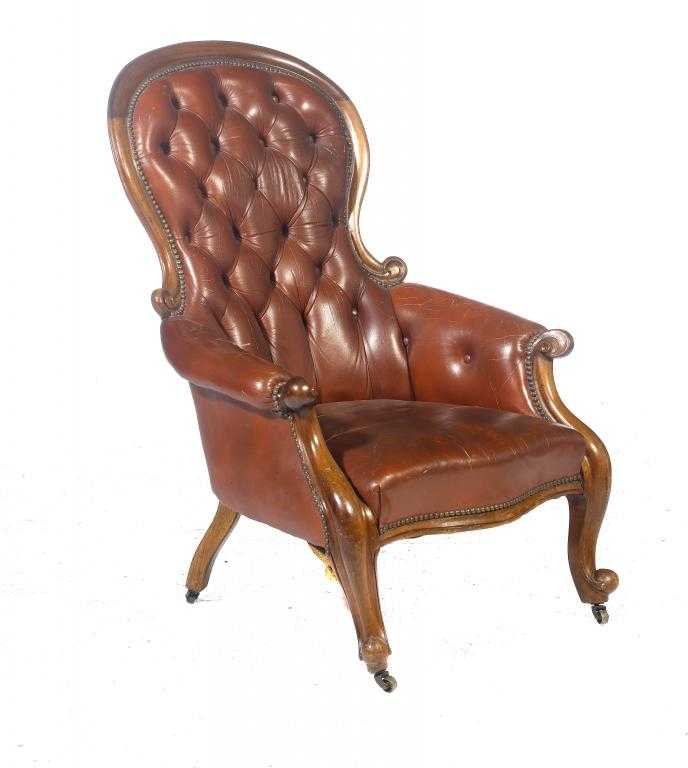 Appraisal: A VICTORIAN MAHOGANY ARMCHAIR with moulded scrolling back and arm