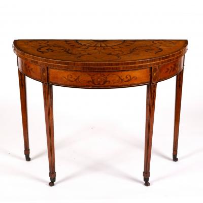 Appraisal: An th Century satinwood card table of Adam design finely