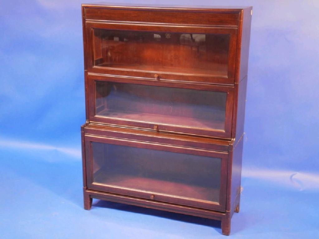 Appraisal: A mahogany Wernike type three-tier bookcase cm wide