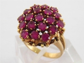 Appraisal: A carat gold and ruby cluster ring the cluster composed