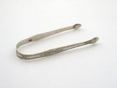 Appraisal: A pair of George III silver sugar tongs with bright