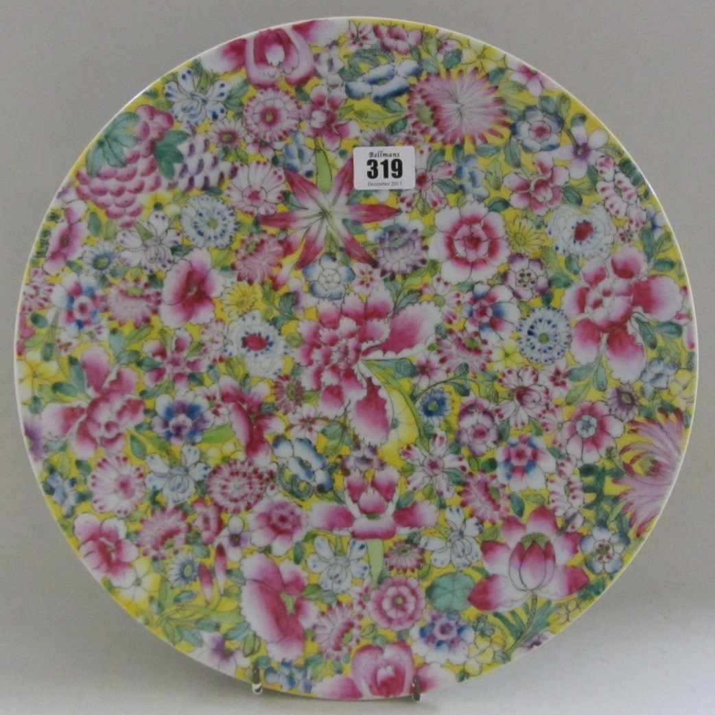 Appraisal: A Chinese famille rose millefleurs dish th century painted with