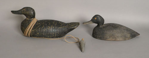 Appraisal: Two carved and painted duck decoys